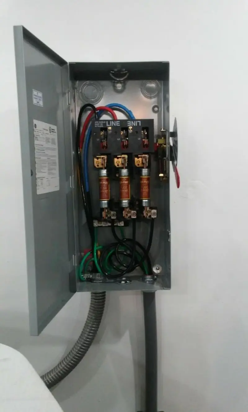 Three-phase disconnect switch installed for Smoke Detector Installation in Ridley